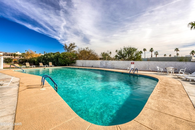 1824 Montana Vis Unit D, Lake Havasu City, AZ 86403 - community pool featuring a patio and fence