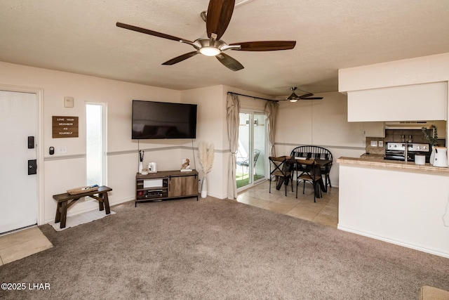 1824 Montana Vis Unit D, Lake Havasu City, AZ 86403 - living area with ceiling fan, light carpet, and light tile patterned flooring
