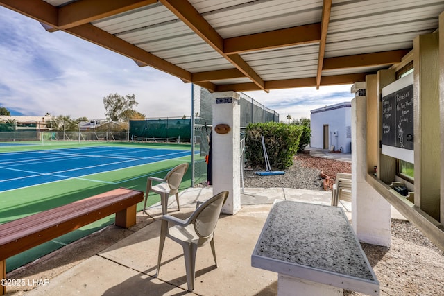 1824 Montana Vis Unit D, Lake Havasu City, AZ 86403 - view of patio with a tennis court and fence