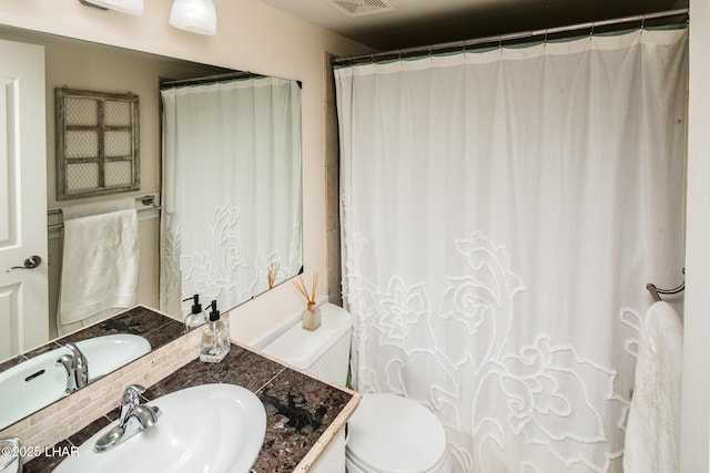 1824 Montana Vis Unit D, Lake Havasu City, AZ 86403 - full bathroom featuring toilet, vanity, and visible vents