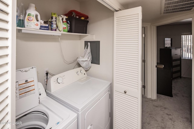 washroom featuring washing machine and dryer and carpet flooring