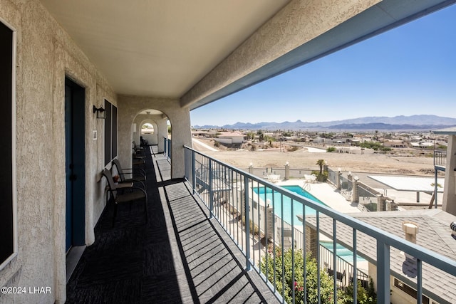 balcony featuring a mountain view