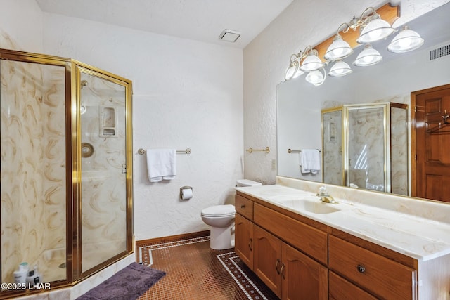 bathroom with vanity, tile patterned flooring, visible vents, and a shower stall