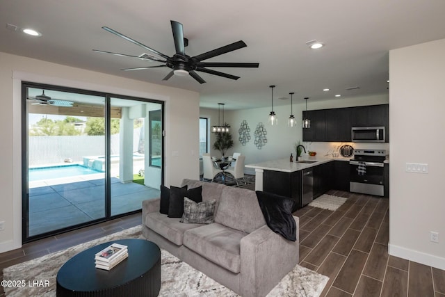 2185 Palo Verde Blvd S, Lake Havasu City, AZ 86403 - living room featuring a ceiling fan, dark wood-style floors, and recessed lighting