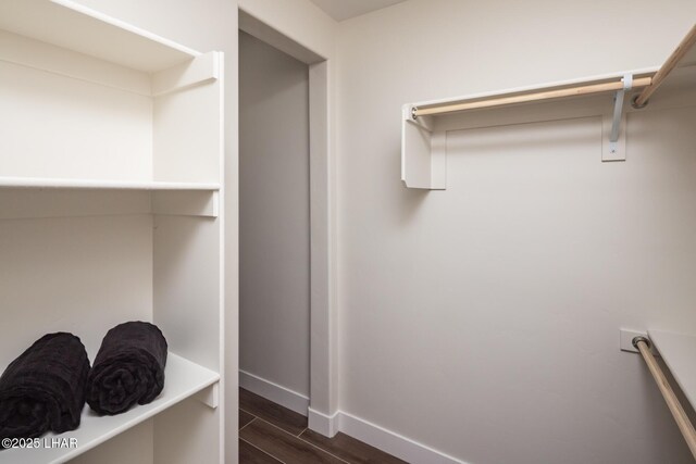 2185 Palo Verde Blvd S, Lake Havasu City, AZ 86403 - spacious closet featuring dark wood-style floors