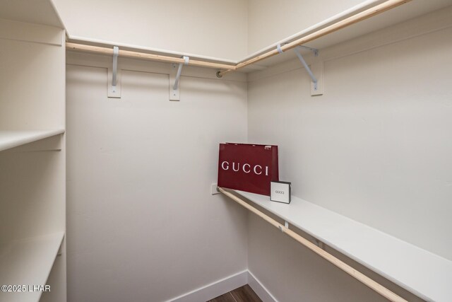 2185 Palo Verde Blvd S, Lake Havasu City, AZ 86403 - spacious closet featuring dark wood-style floors