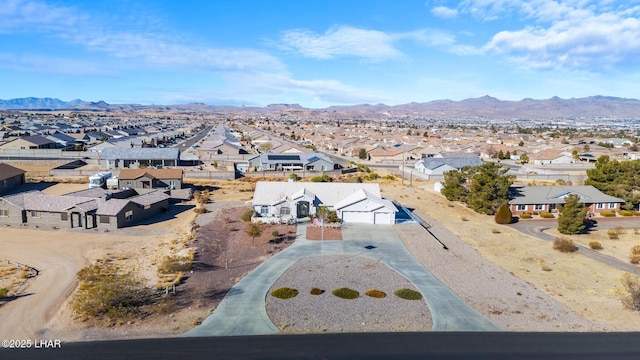 aerial view with a mountain view and a residential view