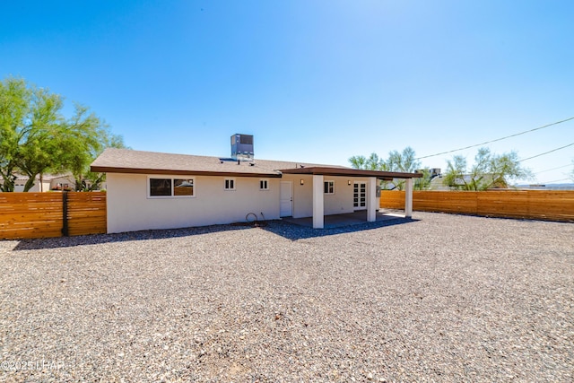 2529 Sunchief Ln, Lake Havasu City, AZ 86403 - back of property featuring a patio, a fenced backyard, and stucco siding