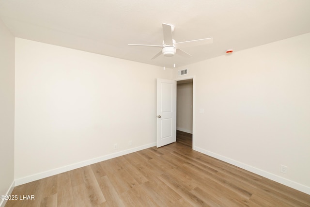 2529 Sunchief Ln, Lake Havasu City, AZ 86403 - unfurnished room featuring light wood-type flooring, ceiling fan, and baseboards