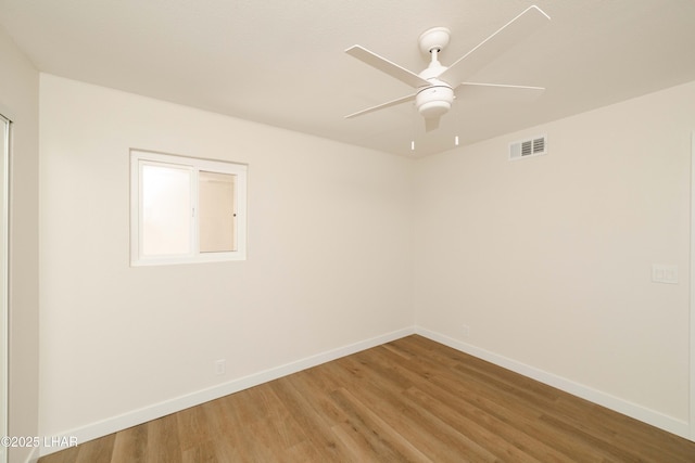 2529 Sunchief Ln, Lake Havasu City, AZ 86403 - unfurnished room with a ceiling fan, light wood finished floors, and baseboards