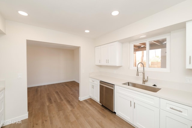 2529 Sunchief Ln, Lake Havasu City, AZ 86403 - kitchen featuring dishwasher, a sink, light countertops, white cabinets, and recessed lighting