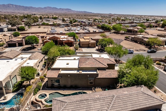 bird's eye view with a residential view and a mountain view