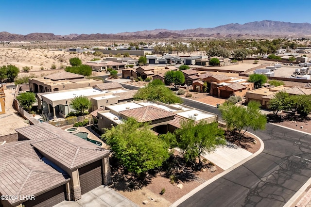 bird's eye view featuring a mountain view and a residential view