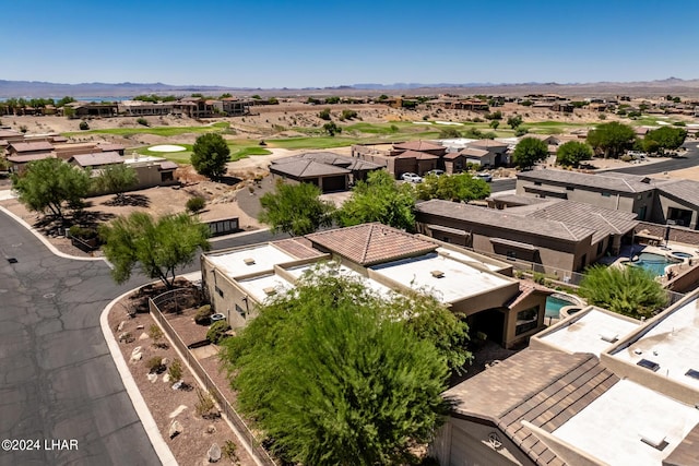 aerial view featuring a mountain view and a residential view