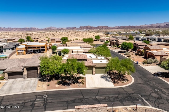 bird's eye view featuring a residential view and a mountain view