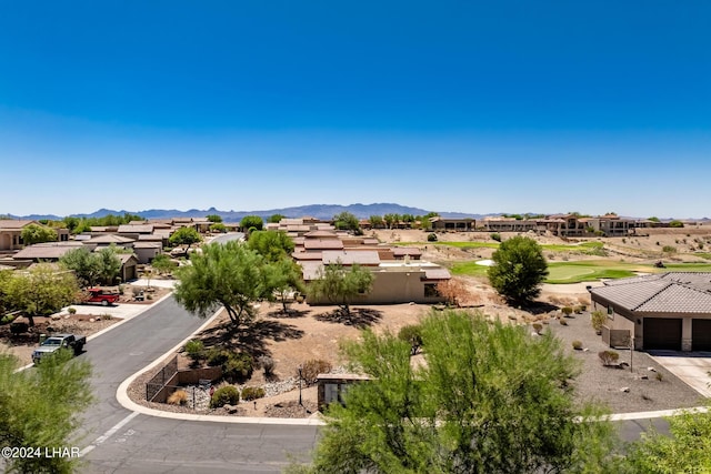 drone / aerial view featuring a mountain view and a residential view