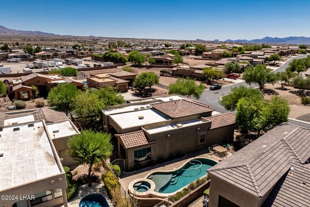 bird's eye view with a mountain view and a residential view