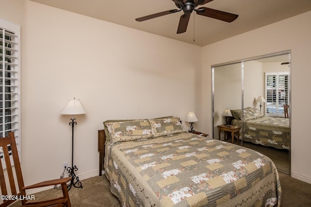 carpeted bedroom featuring a ceiling fan, baseboards, and a closet