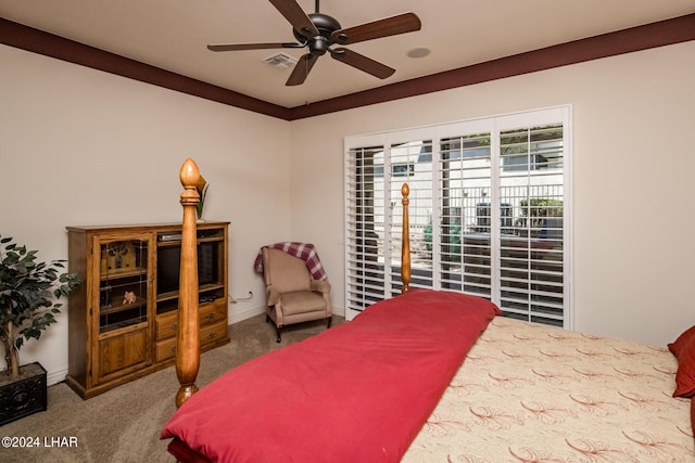 carpeted bedroom with access to exterior, baseboards, visible vents, and ceiling fan