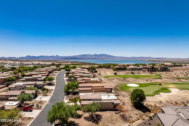 property view of mountains featuring a residential view, view of golf course, and a water view