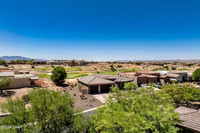 drone / aerial view featuring a mountain view and a residential view