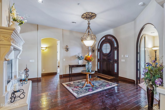 entrance foyer with dark hardwood / wood-style flooring