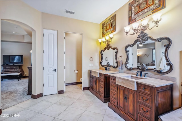 bathroom with tile patterned floors, toilet, and vanity