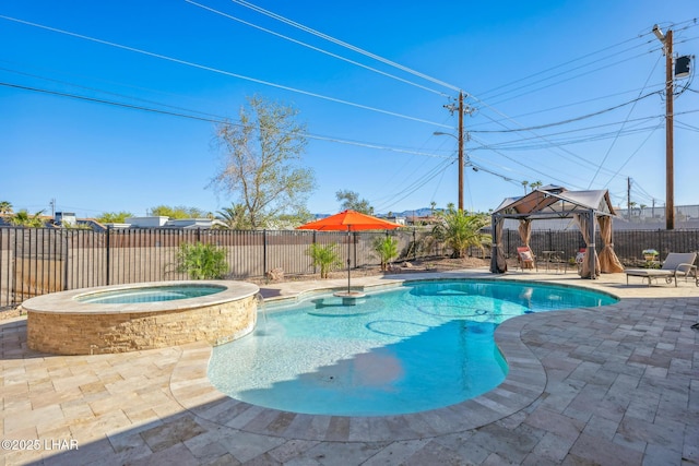 view of pool featuring a gazebo, a patio, a fenced backyard, and a pool with connected hot tub