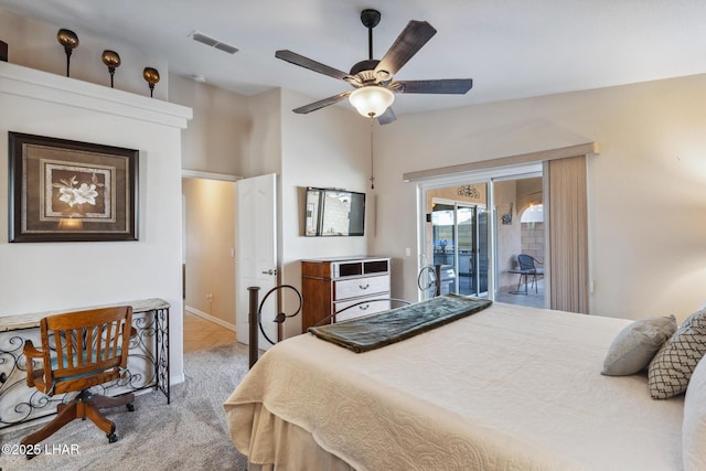 bedroom with a ceiling fan, visible vents, carpet floors, lofted ceiling, and access to outside