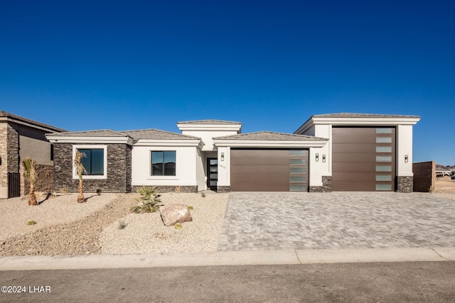 prairie-style home with a garage