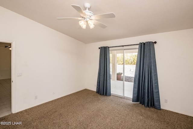 spare room featuring carpet floors and a ceiling fan