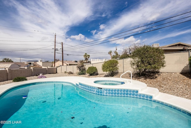 view of pool featuring a fenced in pool, a fenced backyard, and an in ground hot tub