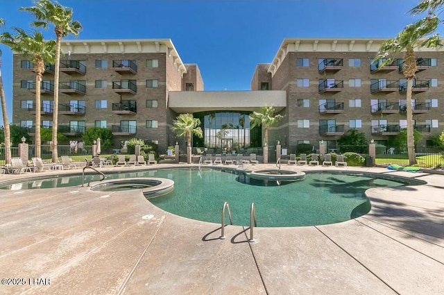 777 Harrah Way Unit 318, Lake Havasu City, AZ 86403 - view of swimming pool featuring a community hot tub and a patio
