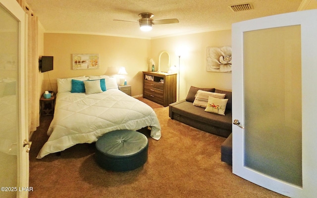 777 Harrah Way Unit 318, Lake Havasu City, AZ 86403 - carpeted bedroom featuring ceiling fan, ornamental molding, and a textured ceiling