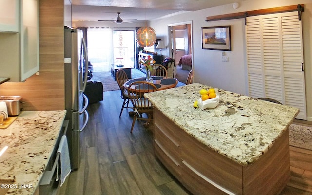 777 Harrah Way Unit 318, Lake Havasu City, AZ 86403 - dining space with dark wood-type flooring and ceiling fan