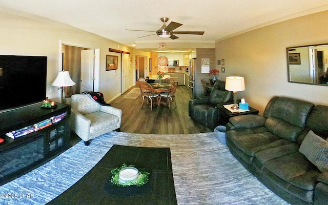 777 Harrah Way Unit 318, Lake Havasu City, AZ 86403 - living room featuring hardwood / wood-style flooring, ceiling fan, and crown molding