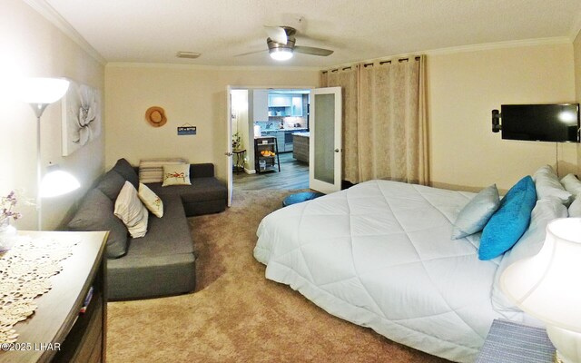777 Harrah Way Unit 318, Lake Havasu City, AZ 86403 - carpeted bedroom with crown molding and ceiling fan
