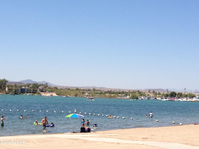 777 Harrah Way Unit 318, Lake Havasu City, AZ 86403 - property view of water with a mountain view and a beach view