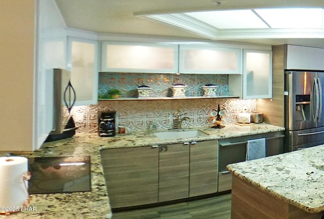 777 Harrah Way Unit 318, Lake Havasu City, AZ 86403 - kitchen featuring sink, decorative backsplash, hardwood / wood-style flooring, light stone counters, and stainless steel refrigerator with ice dispenser