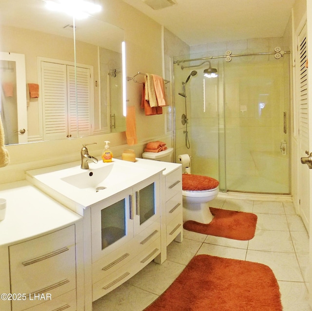 777 Harrah Way Unit 318, Lake Havasu City, AZ 86403 - bathroom with vanity, tile patterned floors, toilet, and walk in shower