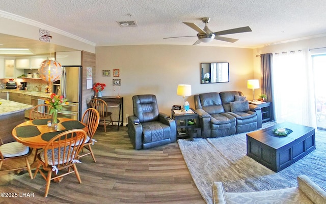 777 Harrah Way Unit 318, Lake Havasu City, AZ 86403 - living room with a textured ceiling, wood-type flooring, ornamental molding, and ceiling fan