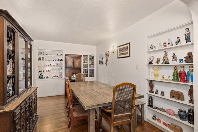 dining space featuring hardwood / wood-style flooring