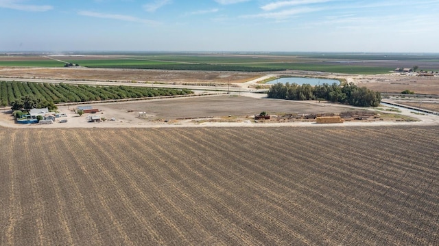 aerial view featuring a rural view and a water view