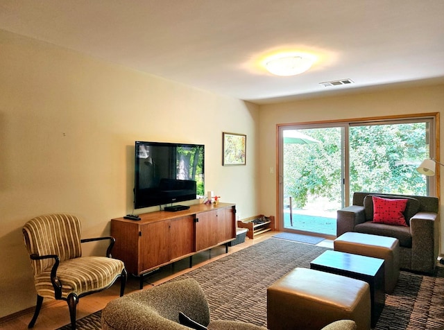 living room with hardwood / wood-style flooring