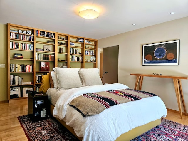 bedroom featuring light hardwood / wood-style flooring