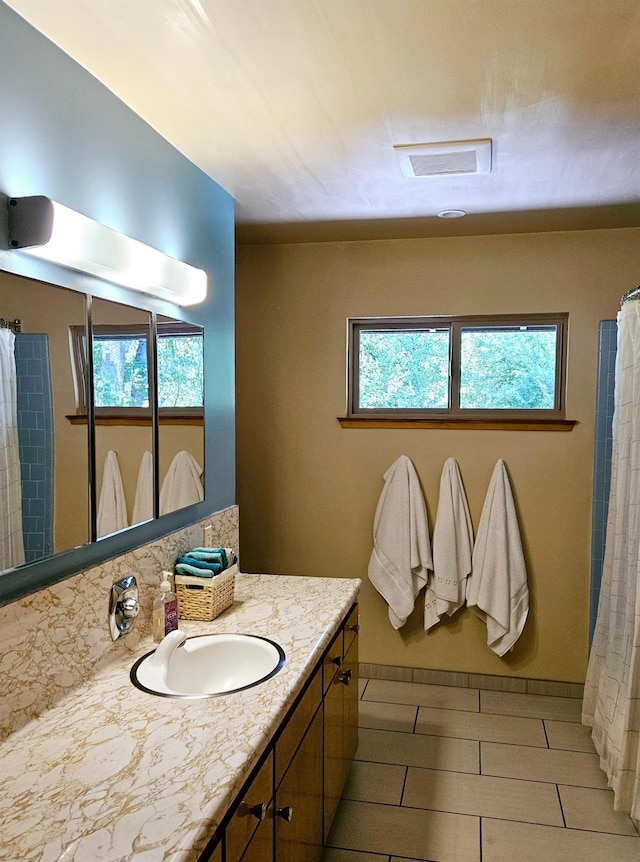 bathroom featuring vanity