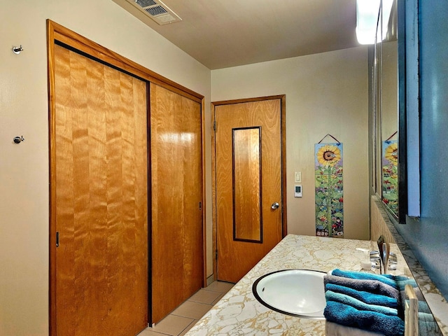 bathroom featuring vanity and tile patterned floors