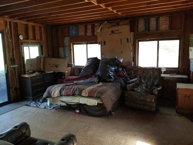 bedroom featuring multiple windows