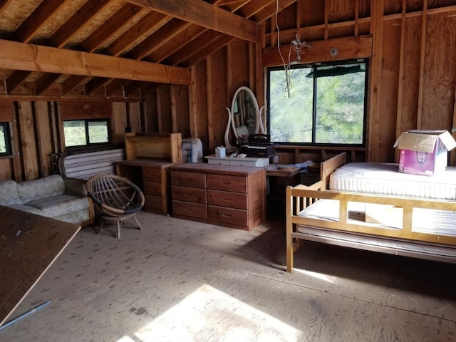 interior space with lofted ceiling and multiple windows