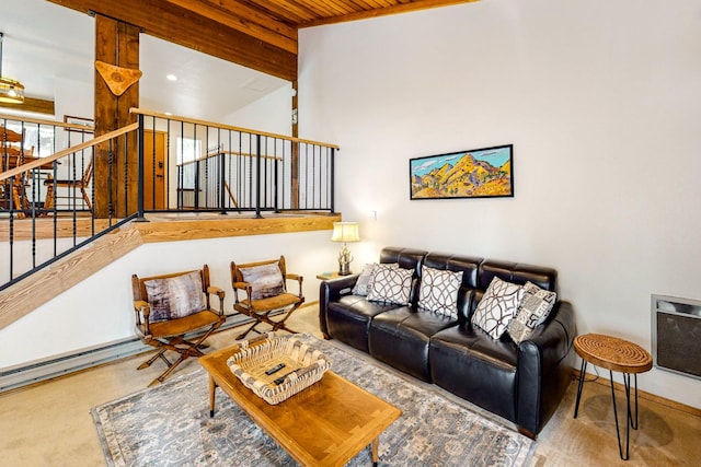 living room with carpet flooring and a high ceiling